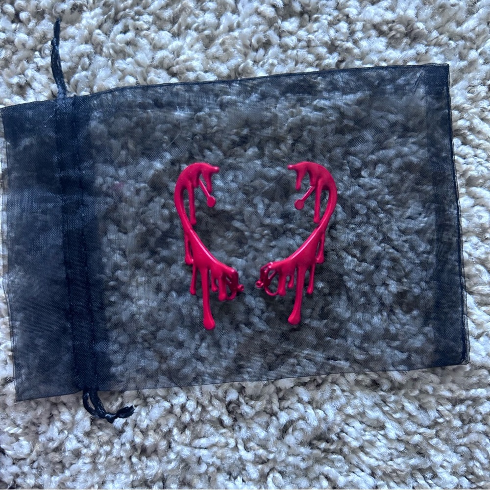 Dripping blood cuff earrings